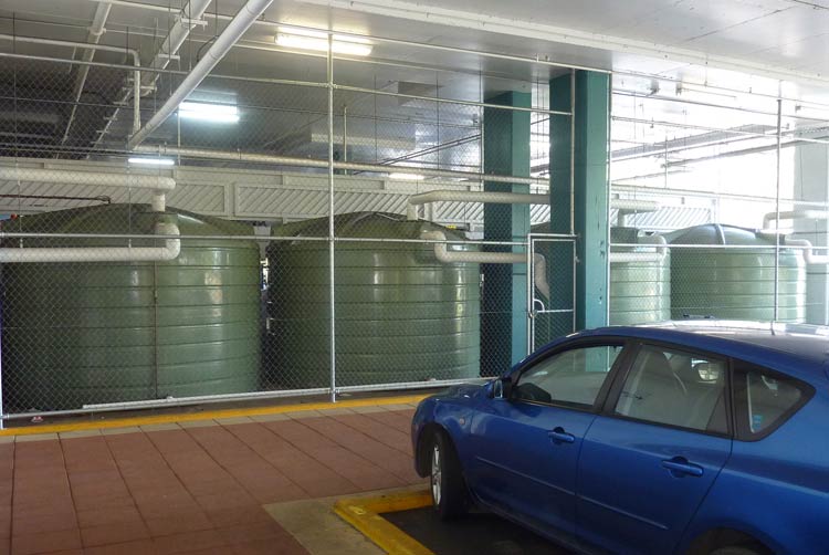 bank of 5000 gallon rainwater tanks